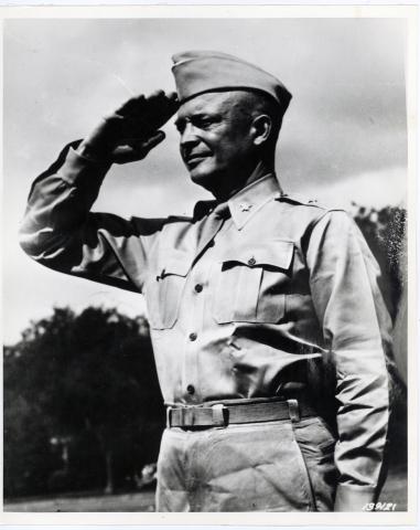 Black and white photo taken in 1942 of General Eisenhower saluting.